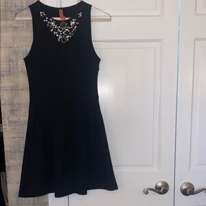 Black Sleeveless Dress with Embellished Neckline